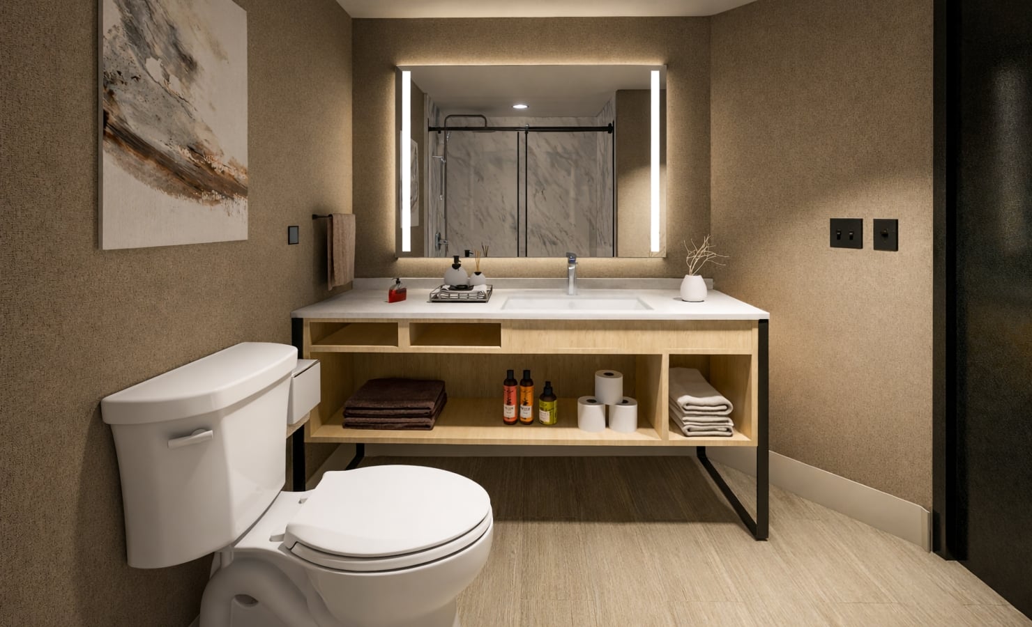 A modern bathroom features a white toilet beside a wood vanity with a white sink and a large lighted mirror. Organized toiletries and towels fill the vanity's shelves; a shower is reflected.