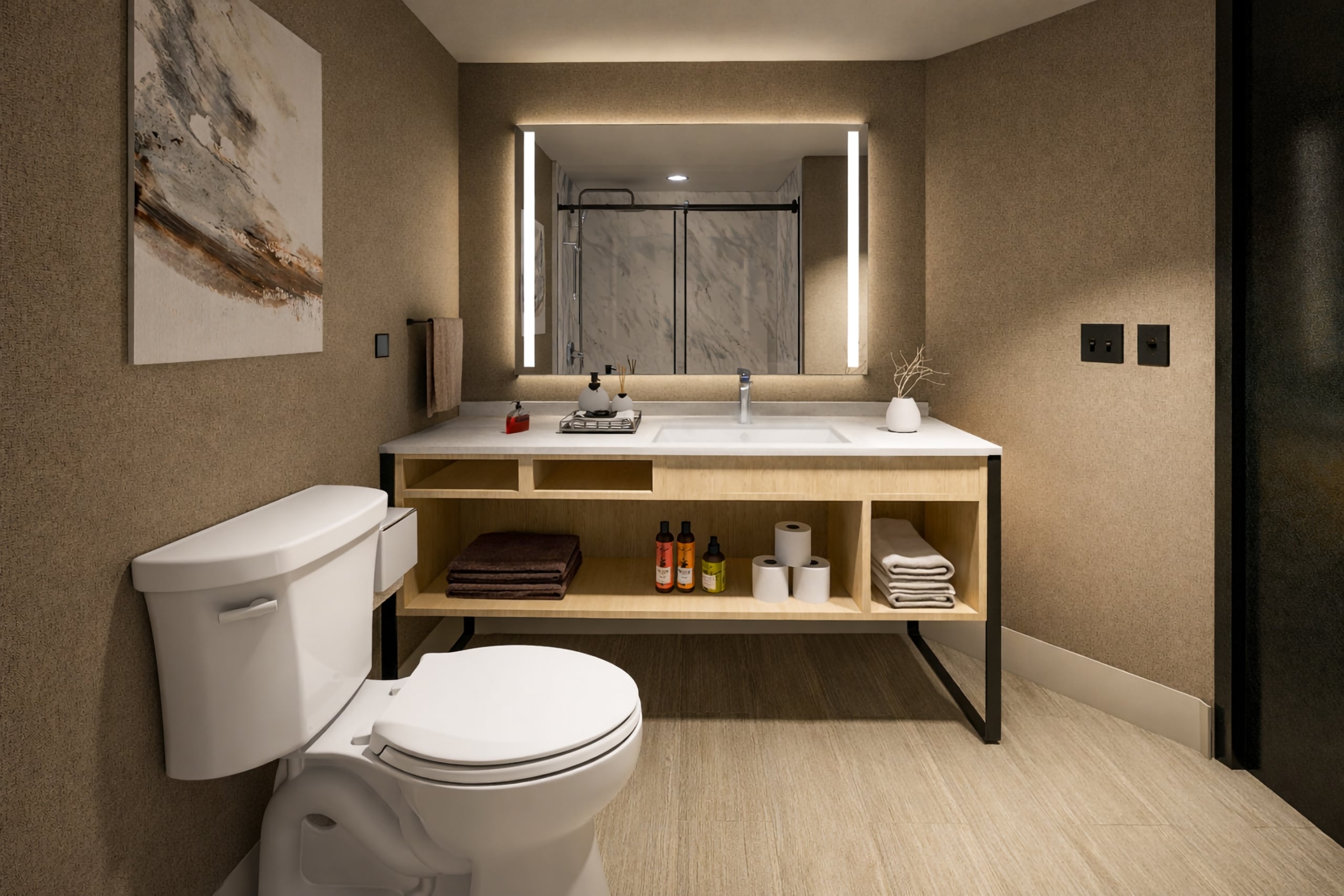 A modern bathroom features a white toilet beside a wood vanity with a white sink and a large lighted mirror. Organized toiletries and towels fill the vanity's shelves; a shower is reflected.