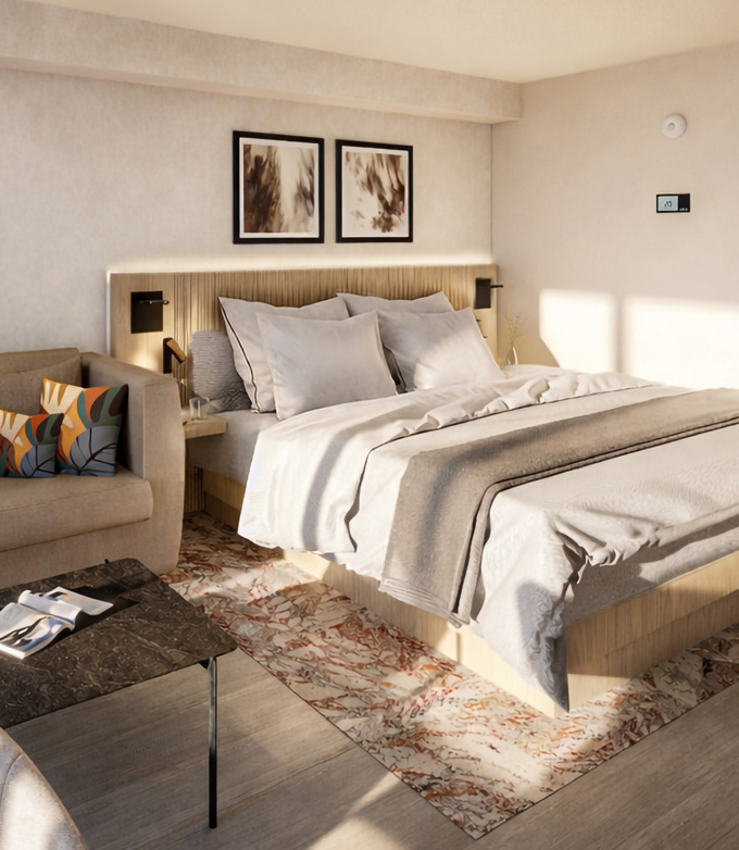 A large bed with light grey bedding and a wooden headboard sits neatly within a modern, sunlit bedroom. Abstract art, a sofa, and a patterned rug complete the space. Text: 23.5°C